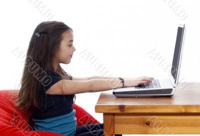 Young girl in front of a laptop