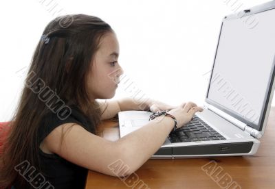 Young girl in front of a laptop