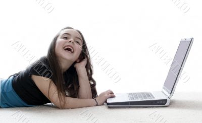 Young girl in front of a laptop