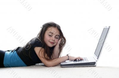 Young girl in front of a laptop