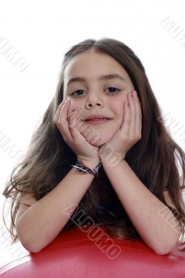 Young girl with an exercises ball