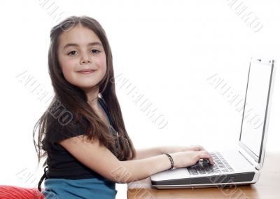 Young girl in front of a laptop