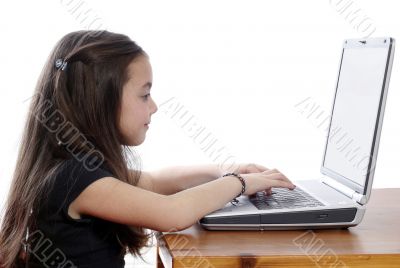 Young girl in front of a laptop