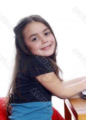 Young girl in front of a laptop