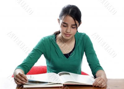 young woman reading in the library