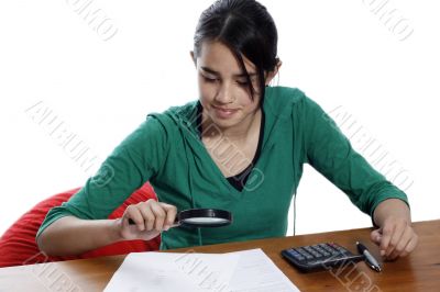 young woman holding a pen