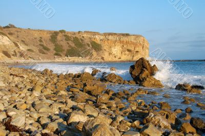 Rocky Beach with waves  splashing Water