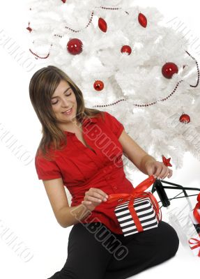 Happy woman with Chirstmas gifts