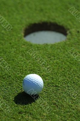 Golf ball close to the hole