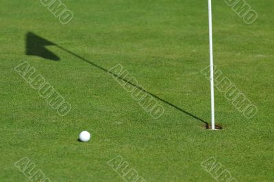 golf ball on green course