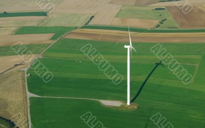 Aerial view of a lonely  wind turbine