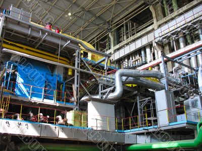 Machinery, tubes and steam turbine at a power plant