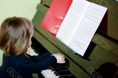 girl by the piano