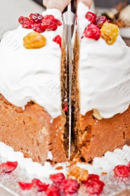 Cutting christmas cake