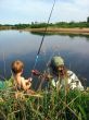 Father and son fishing together