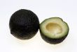  Avocado. Two halfs on white background