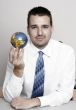 Businessman holding globe