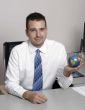 Businessman holding globe