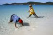 playing at the whitehaven beach