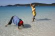 playing at the whitehaven beach