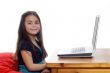 Young girl in front of a laptop