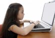 Young girl in front of a laptop