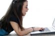 Young girl in front of a laptop