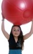 Young girl with an exercises ball