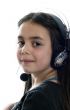 Young girl with headphones smiling at camera