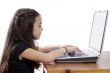 Young girl in front of a laptop