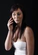 young woman calling by cellular phone