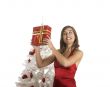 Happy woman with Chirstmas gifts