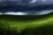 Green land over a storm