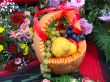 pumpkin basket with autumn harvest fruit and vegetables