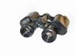 Old field-glass binoculars Isolated over white background