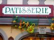 Outdoor sign of a french cake shop - France