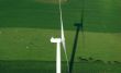 aerial view of windturbine and green meadow