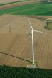 Overview of a windturbine and yellow field