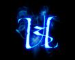 Blue flame magic font over black background. Letter U