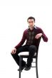 Handsome guy sitting on chair