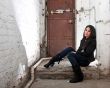 Girl sitting in basement