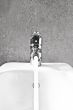 Bidet faucet water front