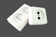 Electrical sockets on a grey background